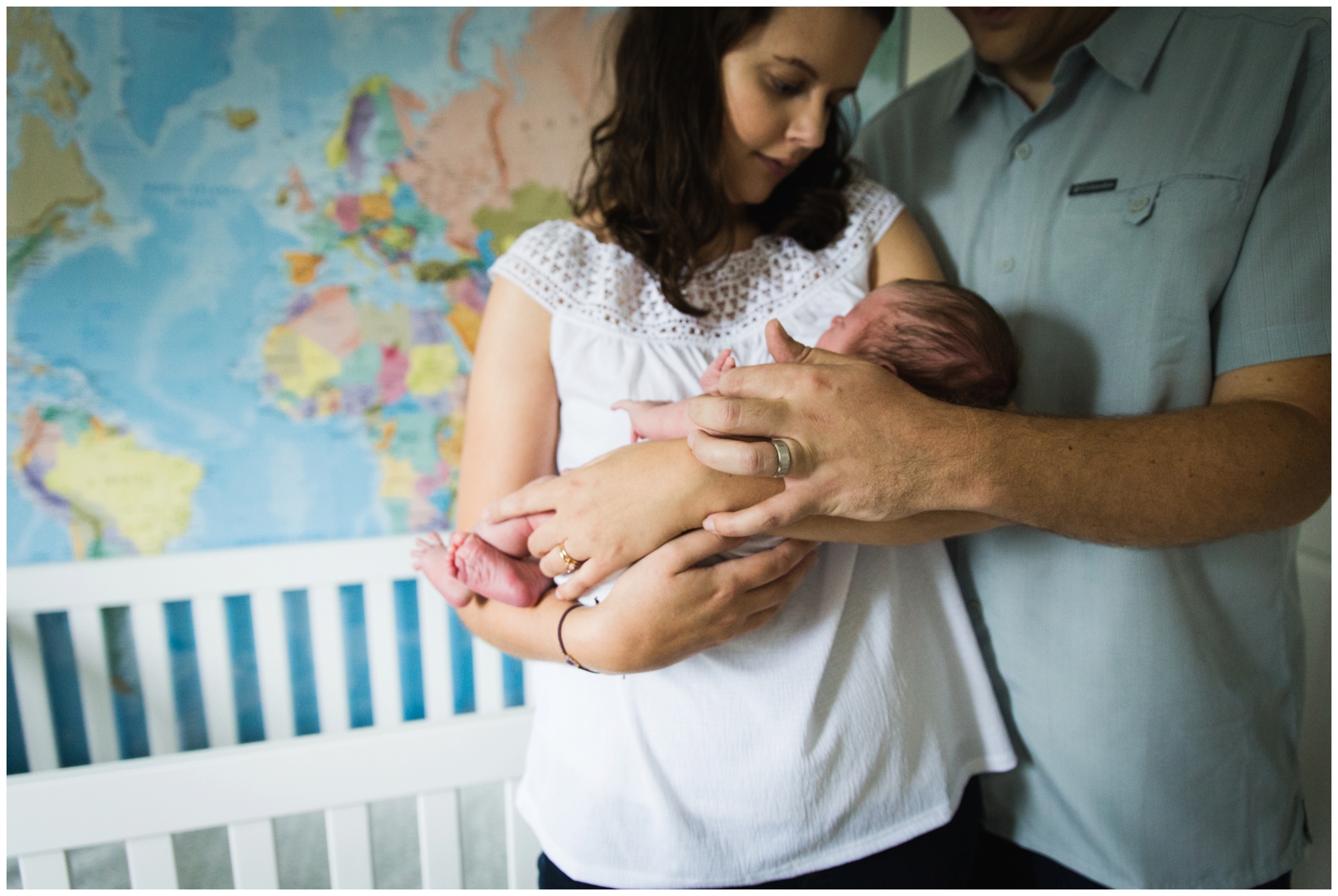 Chatham-kent newborn photographer, newborn photographer in chatham kent, parents holding new baby