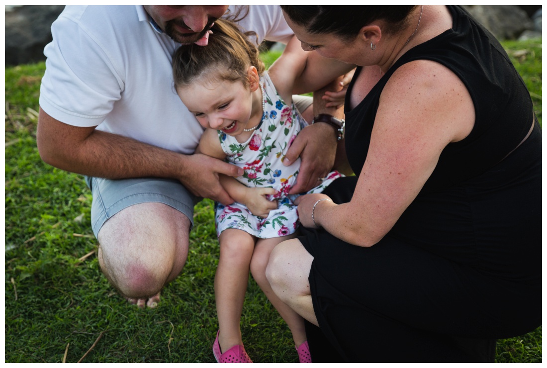 brittany vanruymbeke, chatham-kent family photographer, chatham-kent maternity photography, sarnia maternity photographer, family maternity, family of 3 hugging and laughing