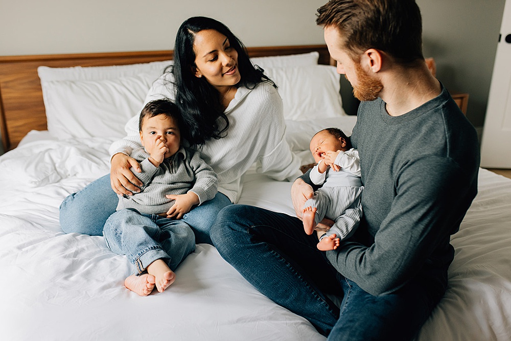 Candid family newborn session with older sibling in Chatham-Kent Ontario