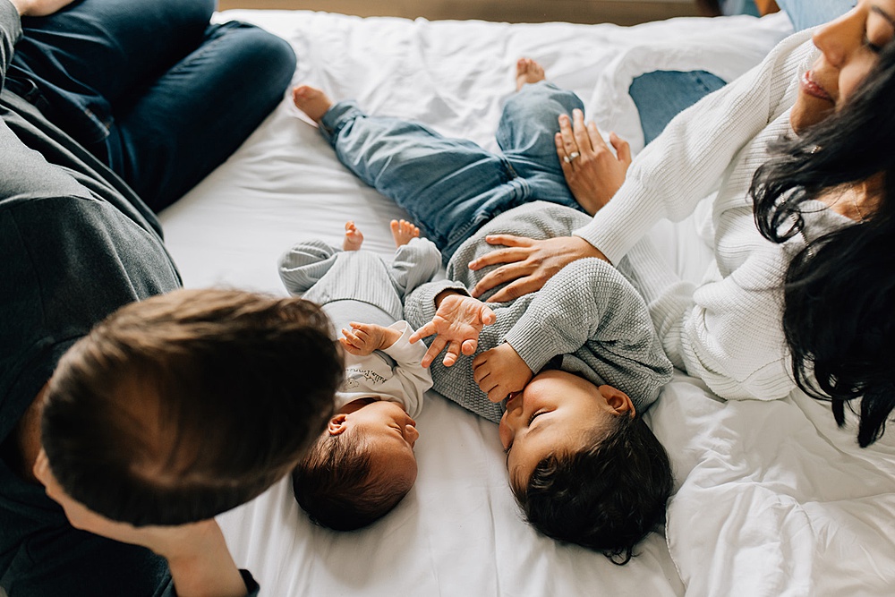 Candid family newborn session with older sibling in Chatham-Kent Ontario
