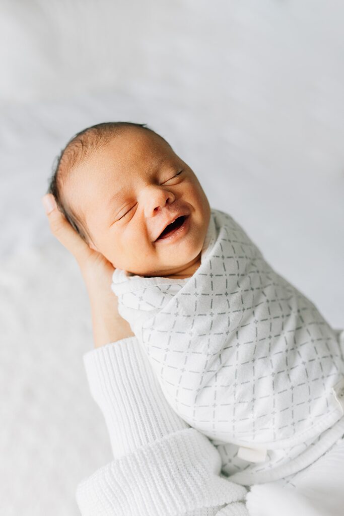Candid family newborn session with older sibling in Chatham-Kent Ontario