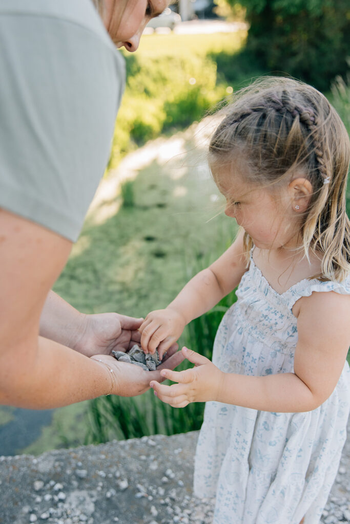 Chatham-Kent Family Photographer Family playing together during relaxed outdoor photo session near Sarnia Ontario