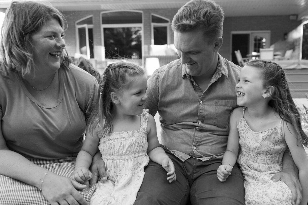 Chatham-Kent Family Photographer Close up photo of family laughing together