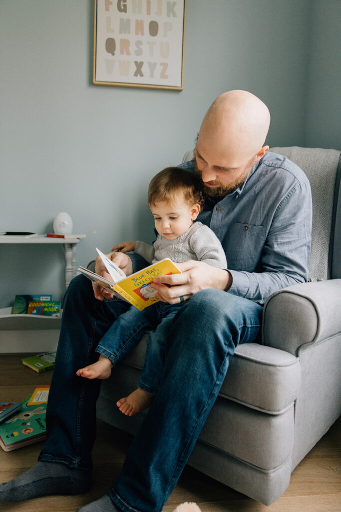 Dad and toddler getting ready for nap during in home family photography session in Sarnia Ontario